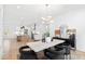 Bright dining room with modern chandelier and stylish furnishings at 2417 Mayview Rd, Raleigh, NC 27607