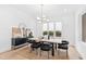 Modern dining room features a large window and stylish decor at 2417 Mayview Rd, Raleigh, NC 27607