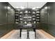 Dark green home office with built-in shelving and a large oval desk at 2417 Mayview Rd, Raleigh, NC 27607