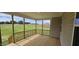 Spacious back porch offering serene views of the surrounding landscape, great for outdoor lounging at 271 White Azalea Way, Homesite 30, Benson, NC 27504