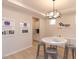 Modern sales office with a table and chairs at 271 White Azalea Way, Homesite 30, Benson, NC 27504