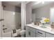 Bathroom featuring a tub with white tile surround and a modern vanity at 294 White Azalea Way, Homesite 74, Benson, NC 27504