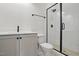 Bathroom features glass enclosed shower with herringbone tile and neutral vanity at 3804 Cobbler View Way, Fuquay Varina, NC 27526