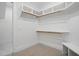 Walk-in closet with carpeted floors and built-in shelves and clothes rods at 3804 Cobbler View Way, Fuquay Varina, NC 27526