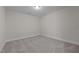 Spacious bedroom with neutral walls and carpeted floor at 811 Pryor St, Mebane, NC 27302
