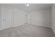 Bedroom with carpeted floor and access to another room at 811 Pryor St, Mebane, NC 27302