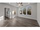 Spacious living room with hardwood floors and access to backyard at 811 Pryor St, Mebane, NC 27302