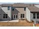 Private backyard with patio and exterior access at 813 Pryor St, Mebane, NC 27302