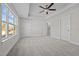 Well-lit bedroom with neutral walls and carpet flooring at 813 Pryor St, Mebane, NC 27302