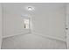 Simple bedroom with carpeted floor and a window at 813 Pryor St, Mebane, NC 27302