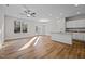 Spacious living room with hardwood floors and lots of natural light at 813 Pryor St, Mebane, NC 27302