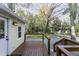 Exterior view from the deck featuring the surrounding trees and home's backyard at 915 S 3Rd St, Sanford, NC 27330
