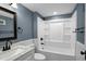 Bathroom featuring a tub/shower combo with vanity at 915 S 3Rd St, Sanford, NC 27330