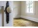 Charming bedroom featuring a vintage door knob, hardwood flooring, and natural light at 915 S 3Rd St, Sanford, NC 27330