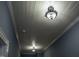 Close-up of the ceiling featuring beadboard and detailed light fixtures at 915 S 3Rd St, Sanford, NC 27330