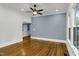 This living room is full of natural light from the many windows, and boasts beautiful hardwood floors at 915 S 3Rd St, Sanford, NC 27330