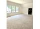 Bright room featuring large windows, offering great natural light at 3341 Colby Chase Dr, Apex, NC 27539