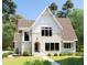 Charming two-story home with brick and vinyl siding, a manicured lawn, and a welcoming front entrance at 3341 Colby Chase Dr, Apex, NC 27539