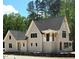 Stunning exterior elevation showcasing a charming and modern design with lots of windows at 3341 Colby Chase Dr, Apex, NC 27539