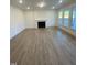 Spacious basement with fireplace and hardwood floors at 55 Sawtooth Oak Ln, Youngsville, NC 27596