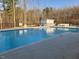 Inviting community pool with plenty of seating at 55 Sawtooth Oak Ln, Youngsville, NC 27596
