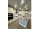 Modern kitchen featuring stainless steel appliances and granite countertops at 55 Sawtooth Oak Ln, Youngsville, NC 27596