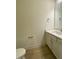 Small half bathroom with white vanity and a toilet at 55 Sawtooth Oak Ln, Youngsville, NC 27596