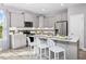 Eat in kitchen with island and stainless steel appliances, perfect for cooking and entertaining at 609 Chopper Ln # Homesite 10, Durham, NC 27703