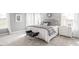 Bright and airy bedroom featuring a comfortable bed, soft lighting, and plush carpet at 609 Chopper Ln # Homesite 10, Durham, NC 27703