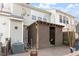 Charming backyard featuring a private, covered outdoor seating area, attached to the house at 610 Canyon Lake Cir, Morrisville, NC 27560