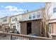 A view of the backyard with an attached covered outdoor area and lush, mature landscaping at 610 Canyon Lake Cir, Morrisville, NC 27560