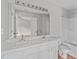 Bathroom features a double vanity with generous counter space, a commode and combination tub/shower at 610 Canyon Lake Cir, Morrisville, NC 27560