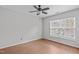 Bedroom featuring natural light, hardwood floors and a modern ceiling fan at 610 Canyon Lake Cir, Morrisville, NC 27560
