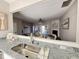 View from the kitchen into the dining and living areas showcasing the open-concept design at 610 Canyon Lake Cir, Morrisville, NC 27560
