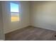 Bright bedroom with carpeted floor and a window offering a view at 6845 Galloway Dr, Middlesex, NC 27557