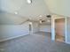 Spacious bonus room with plush carpet, neutral walls, recessed lights, and access to a bathroom at 7553 Sweetwater Dr, Nashville, NC 27856