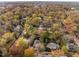 Expansive aerial view showcases the neighborhood with beautiful mature trees and a serene atmosphere at 205 N Boundary St, Chapel Hill, NC 27514
