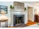 Elegant fireplace with a decorative mantle, perfect for adding warmth and charm to any living space at 205 N Boundary St, Chapel Hill, NC 27514