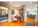 Hallway leading to kitchen with small desk and seating at 205 N Boundary St, Chapel Hill, NC 27514
