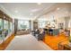 Open-concept living space with a combined living room and kitchen area filled with natural light at 205 N Boundary St, Chapel Hill, NC 27514