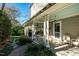 Inviting porch with ceiling fans, comfortable seating, and views of lush landscaping at 205 N Boundary St, Chapel Hill, NC 27514