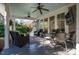 Spacious porch with ceiling fans, outdoor seating, and serene views of the surrounding greenery at 205 N Boundary St, Chapel Hill, NC 27514
