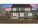 Charming two-story home featuring a covered patio and plenty of windows for natural light at 317 Highland Ridge Ln, Knightdale, NC 27545