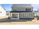 Charming two-story home featuring a covered patio and plenty of windows for natural light at 317 Highland Ridge Ln, Knightdale, NC 27545