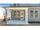 Covered back porch featuring a white column and gray siding at 317 Highland Ridge Ln, Knightdale, NC 27545