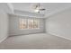 Bedroom with neutral walls, carpet, and bright natural light at 317 Highland Ridge Ln, Knightdale, NC 27545