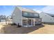 Two-story gray home with a covered patio at 317 Highland Ridge Ln, Knightdale, NC 27545