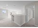 Upstairs hallway that is open and bright with natural light at 317 Highland Ridge Ln, Knightdale, NC 27545