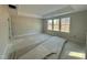 Spacious main bedroom with tray ceiling and ample natural light at 317 Highland Ridge Ln, Knightdale, NC 27545