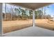 Covered patio overlooking a spacious yard, ready for outdoor enjoyment and relaxation at 317 Highland Ridge Ln, Knightdale, NC 27545
